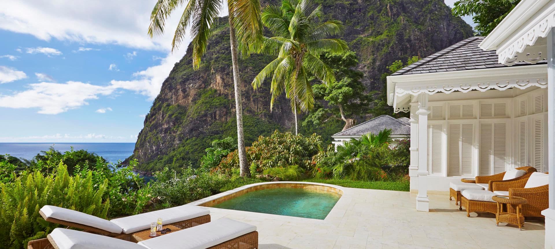 Luxury villa with pool at the sea during blue hour